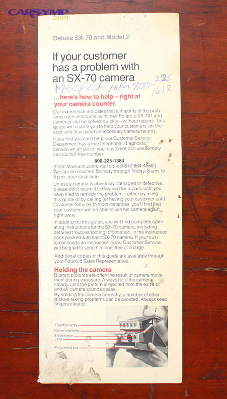 Technician using diagnostic equipment in a workshop