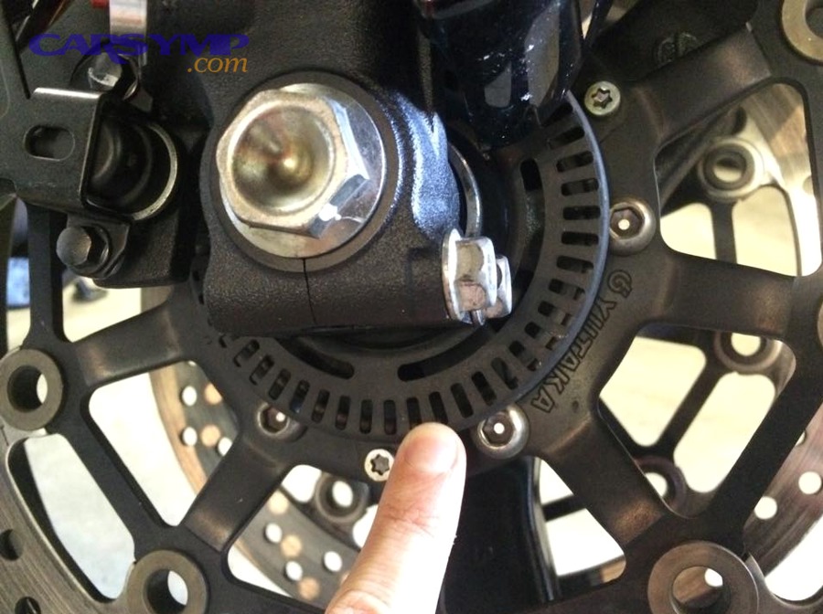 What quick road-test pattern separates ABS activation from rotor issues?