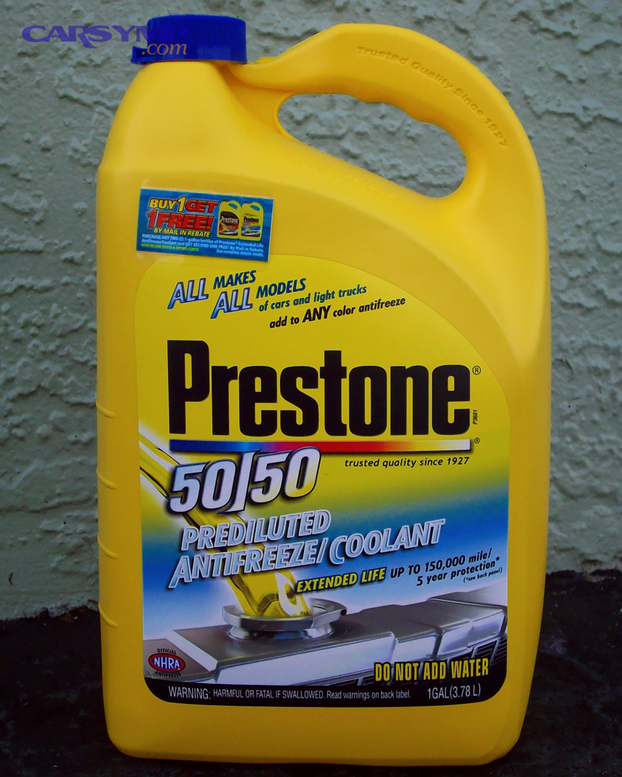 Bottle of antifreeze/coolant representing common coolant fluid found in vehicles