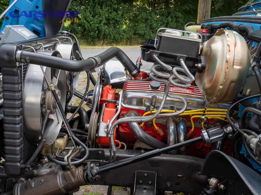 Where should you look to confirm the leak is truly from the valve cover gasket?