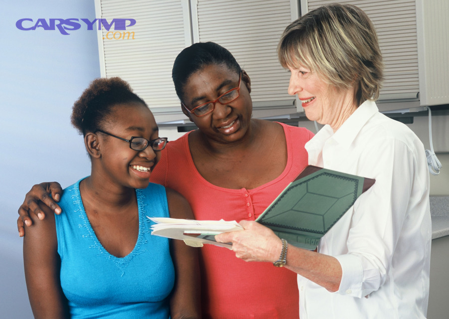 Doctor consults with family during a shared decision-making medical visit