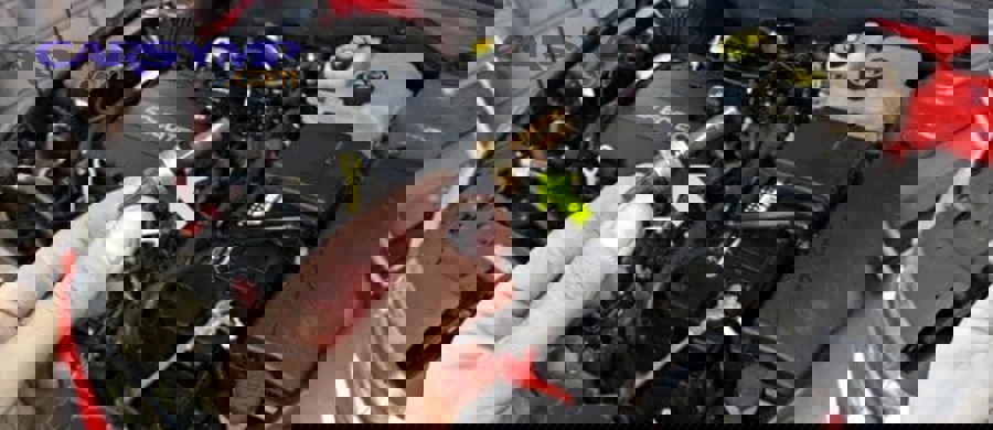 How do low-charge behaviors from a condenser leak show up in real-world operation?