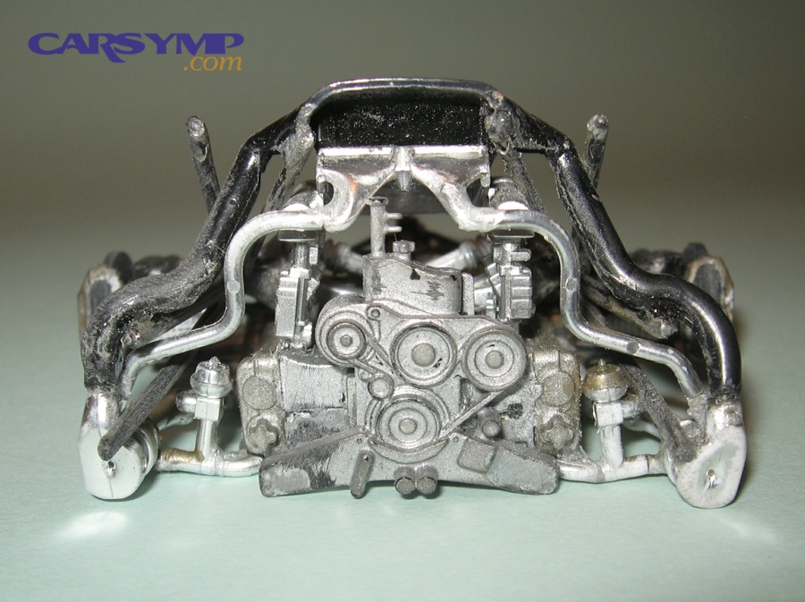 Serpentine belt routing area at the front of an engine