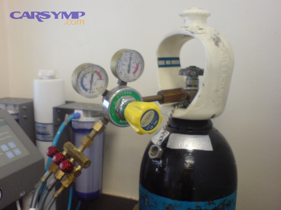 How do you set up a safe nitrogen pressure test without damaging components?