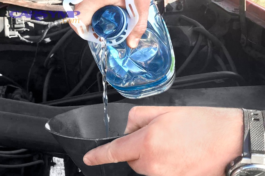 Large drain pan used to catch old coolant during a coolant flush