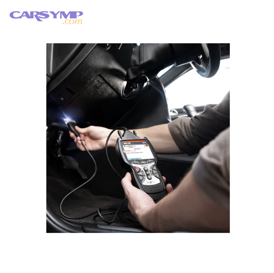 Technician using an OBD2 scan tool connected to a vehicle