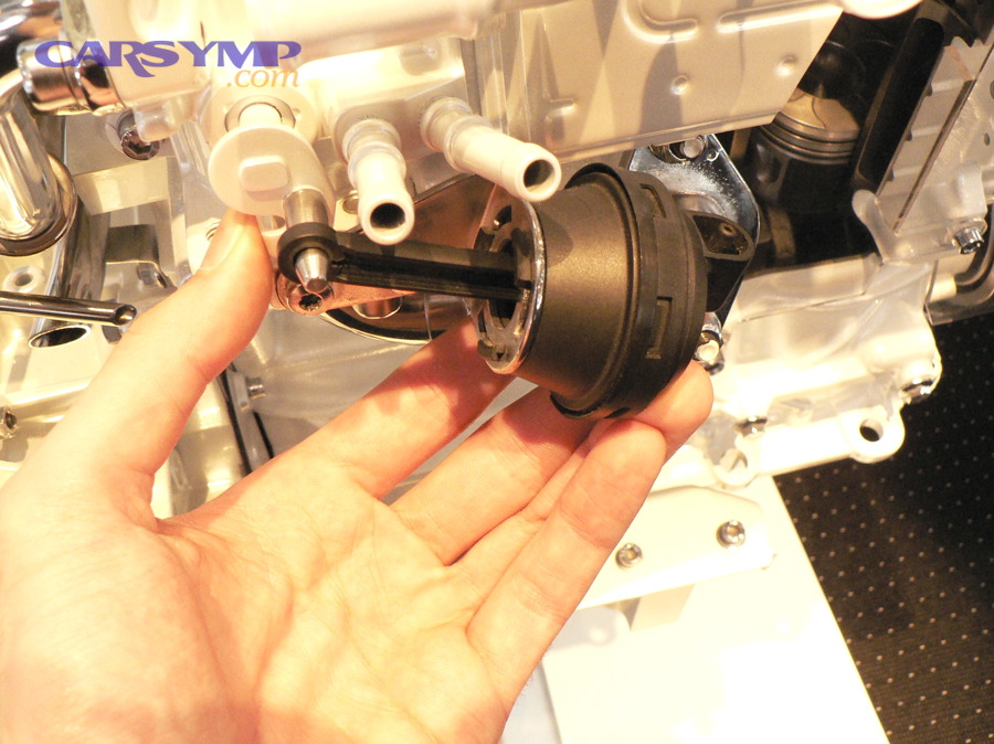 EGR valve actuator mechanism shown in an open position