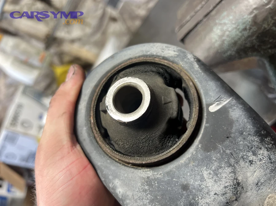 What else can cause clunking noises over bumps besides control arm bushings?