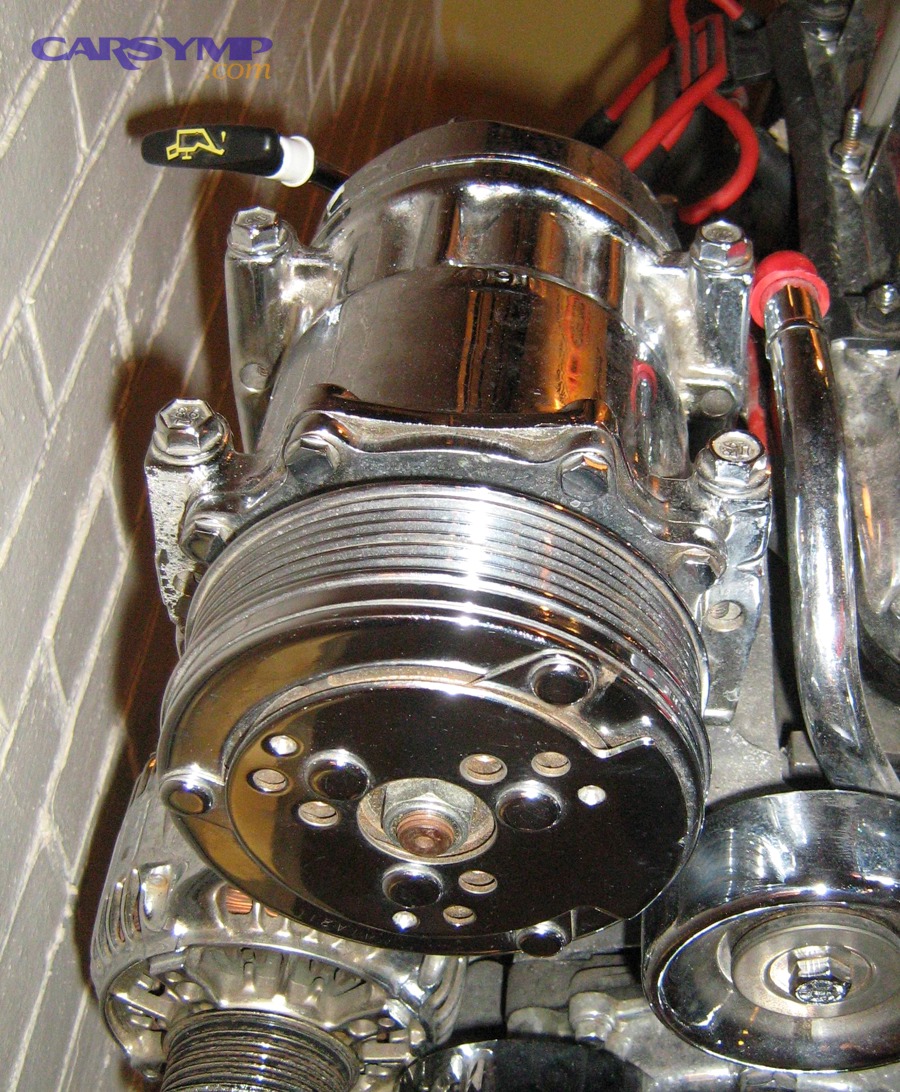 Do you hear intermittent hiss or see oily grime near A/C parts?