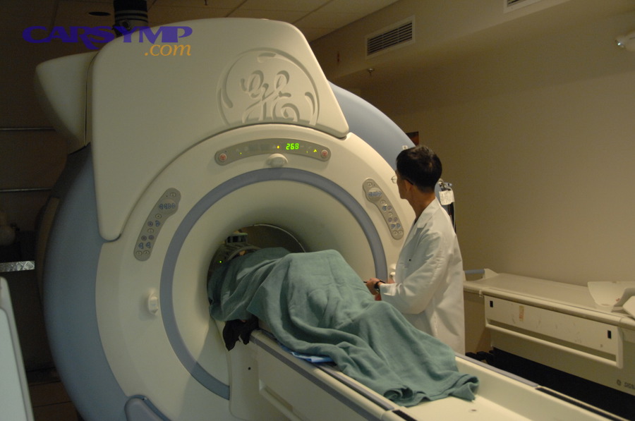 Patient in MRI machine during diagnostic testing that may be reviewed in a second opinion