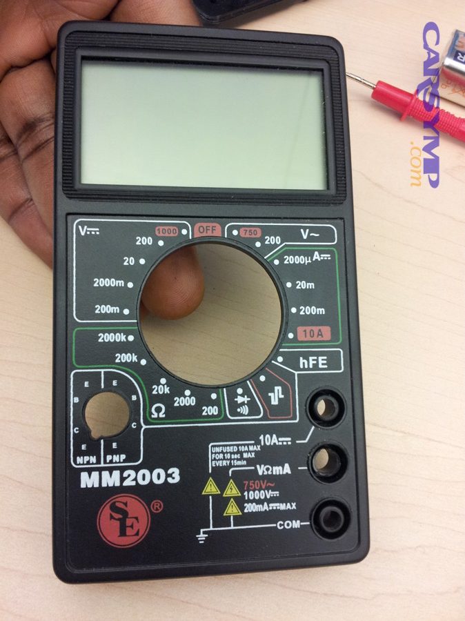 Digital multimeter with dial and input ports