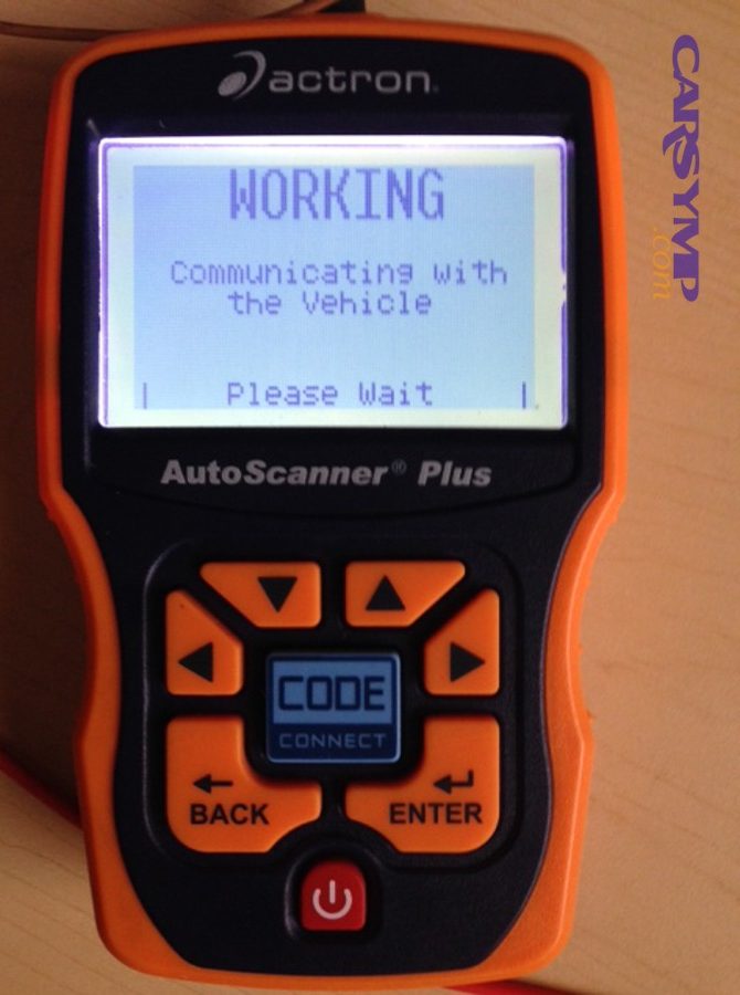 OBD scanner connected to a vehicle for diagnostics