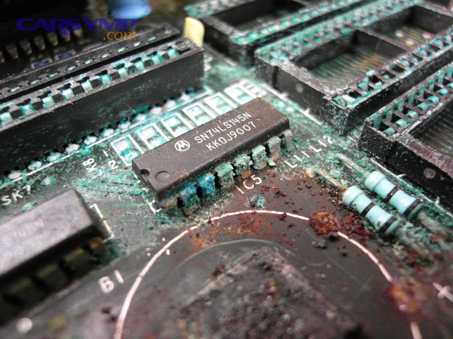 Severe printed circuit board corrosion showing how leaking or moisture exposure can damage copper and components