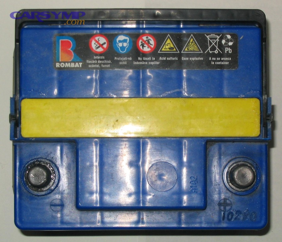 Car battery top view, showing the negative terminal often disconnected for safety during sensor work