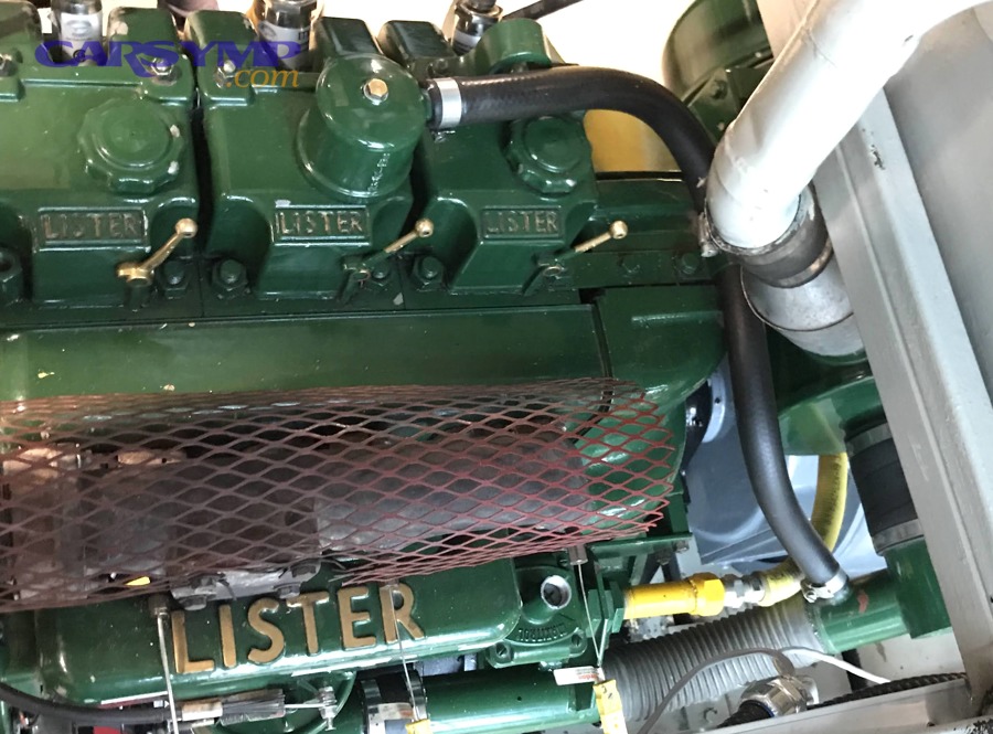 Why does crankcase pressure buildup push oil odor into the engine bay?