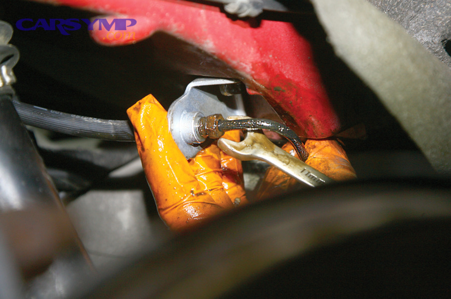 What should you never do with a suspected hydraulic brake leak?