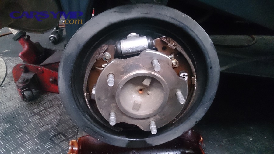 What immediate safety steps should you take if your brake pedal goes soft or to the floor?