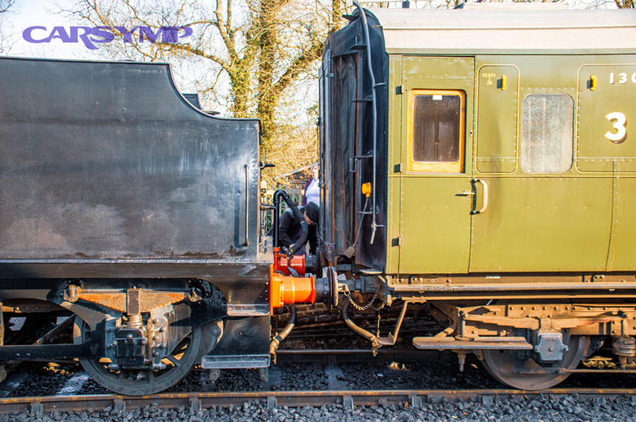 How should you clean spilled brake fluid and reduce the chance of another leak?