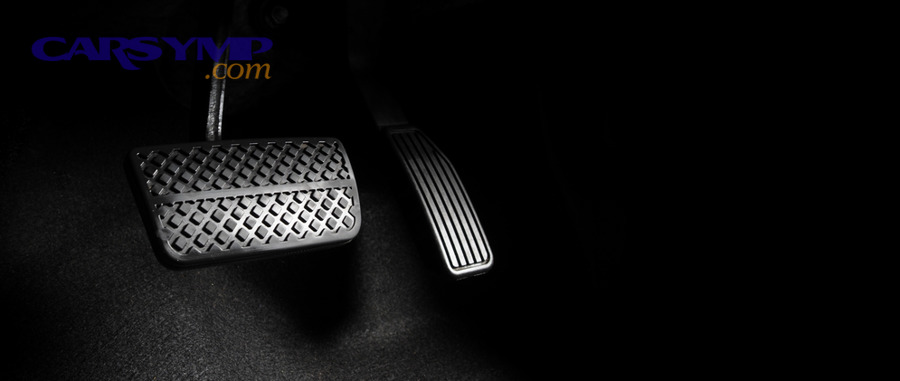 What does a high-pitched squeal during light braking usually signal?