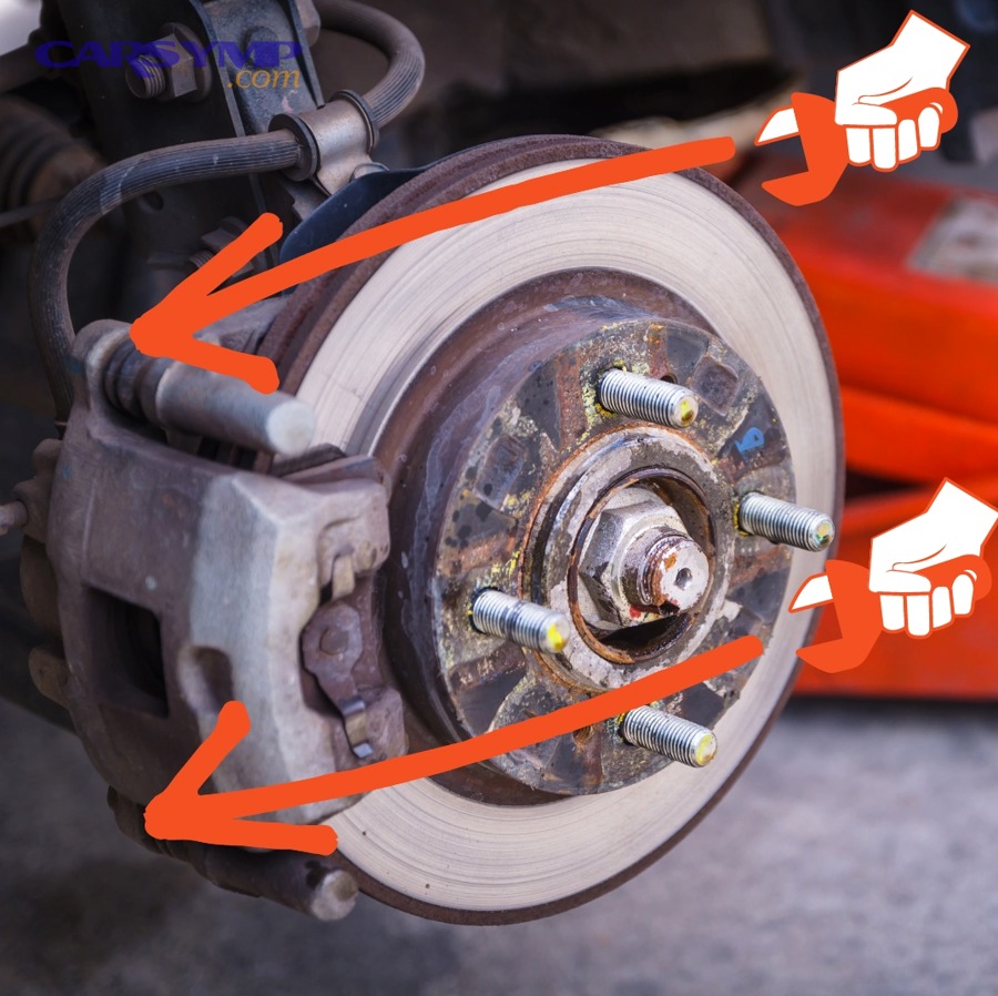 How do you remove the caliper without stressing the hose?