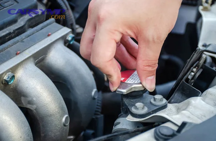 Coolant expansion tank in an engine bay