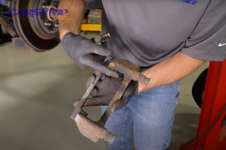 Brake pad and backing plate