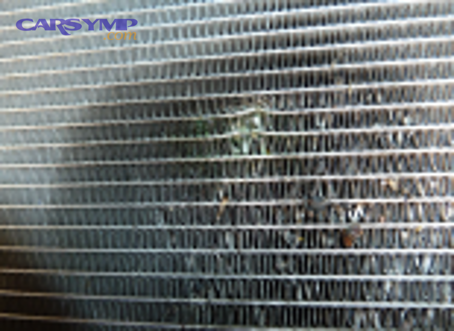 How do debris and road damage causes create symptoms that feel like internal contamination?