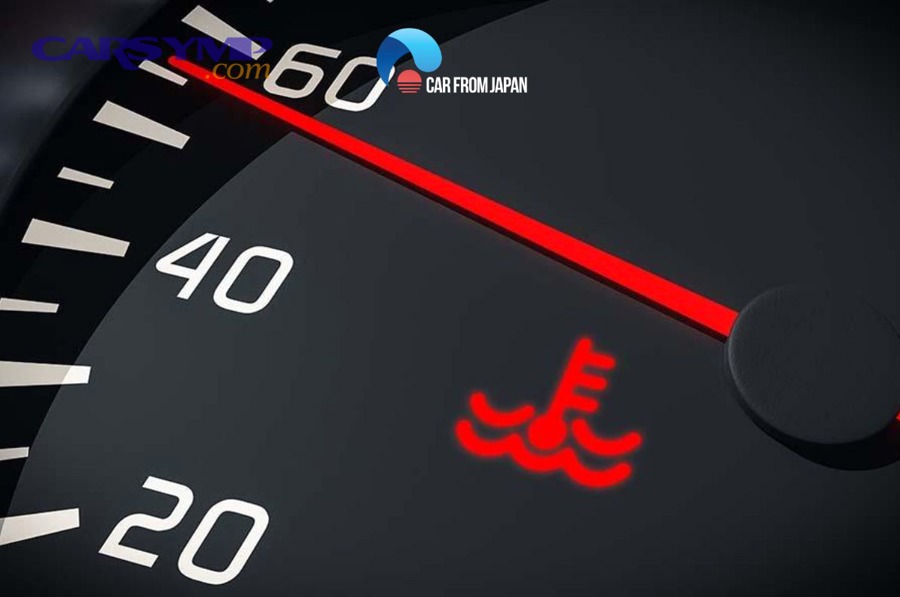 Coolant temperature warning light on dashboard gauge cluster