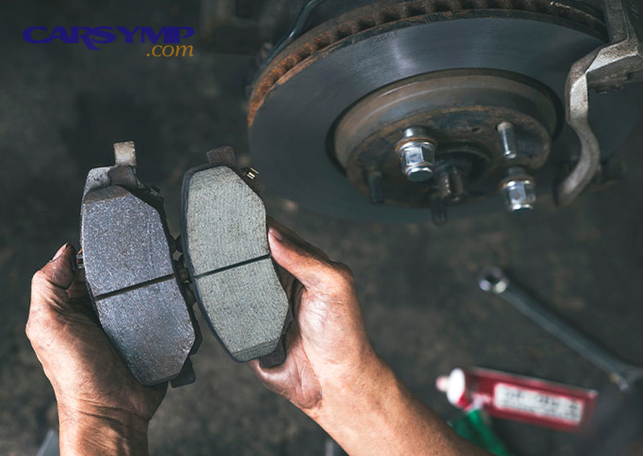 How do you reinstall the caliper and tighten everything correctly?