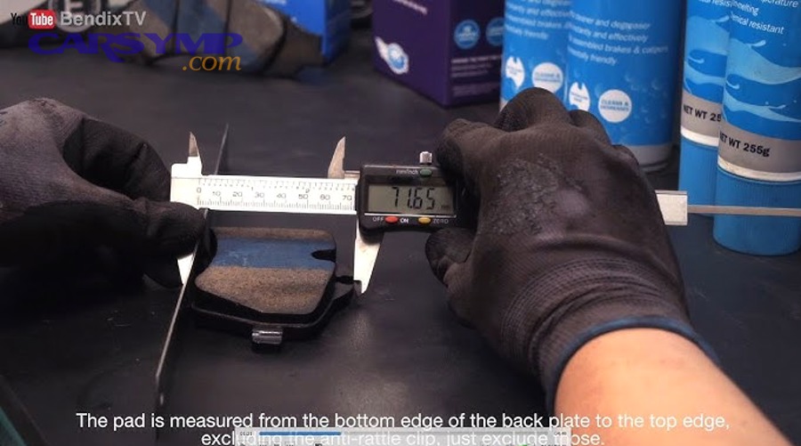 Where should you measure pad thickness on disc brakes?