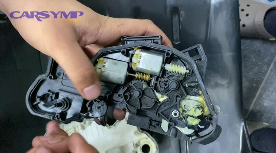 When is the door lock actuator the likely culprit, and what does replacement involve?