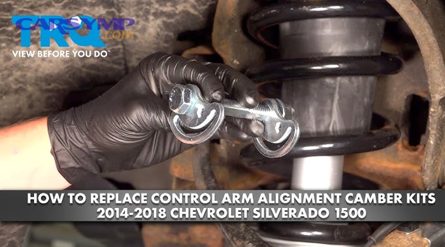 Vehicle on a wheel alignment rack with alignment equipment