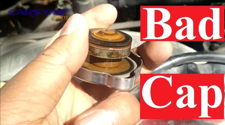 Radiator cap top view showing warning and tightening markings