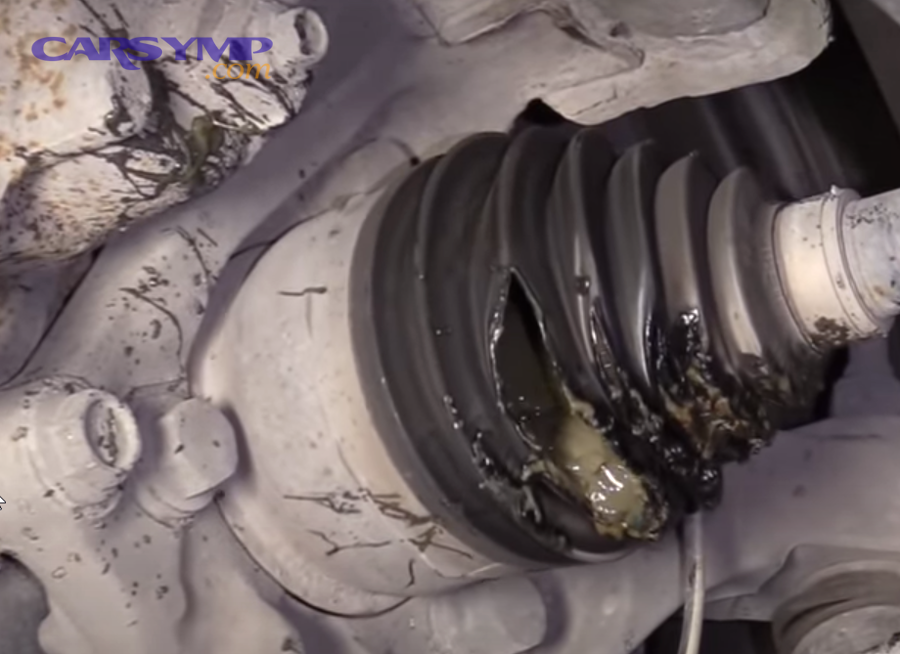 CV axle boot torn with grease leakage