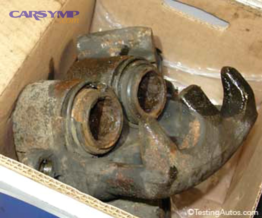 What damage can a sticking caliper cause if you keep driving?