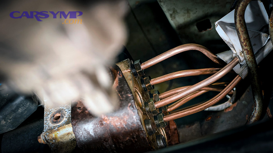 How do you replace a corroded brake line step-by-step without introducing new problems?