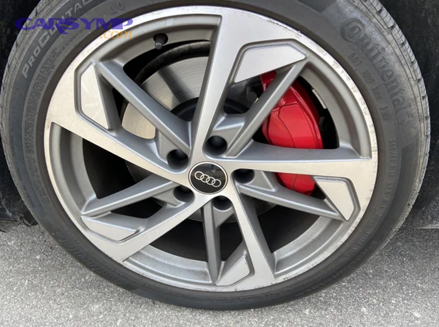 Automotive brake rotor and caliper