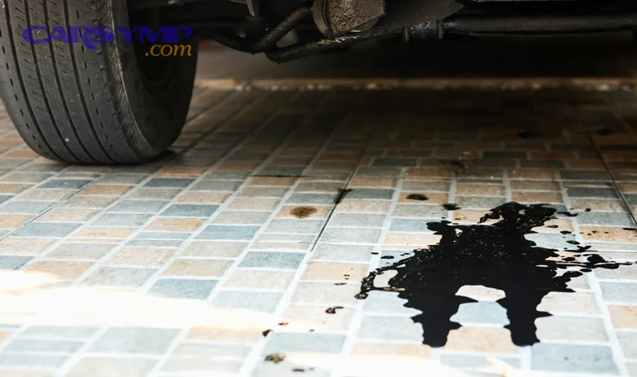 Engine oil draining from a vehicle during service