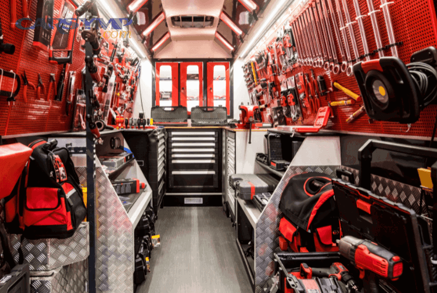 Technician replacing a car battery