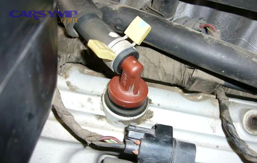 PCV valve example installed on valve cover area
