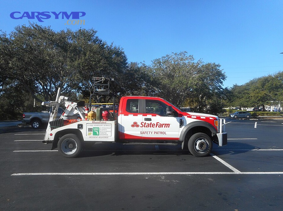 Roadside assistance tow truck representing towing as a safe option when the vehicle should not be driven