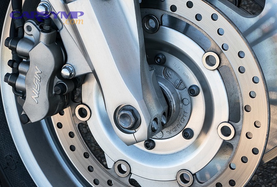 Brake rotor and caliper representing braking system components and failure risks