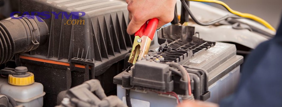 mechanic testing car battery and alternator after repeated dead battery