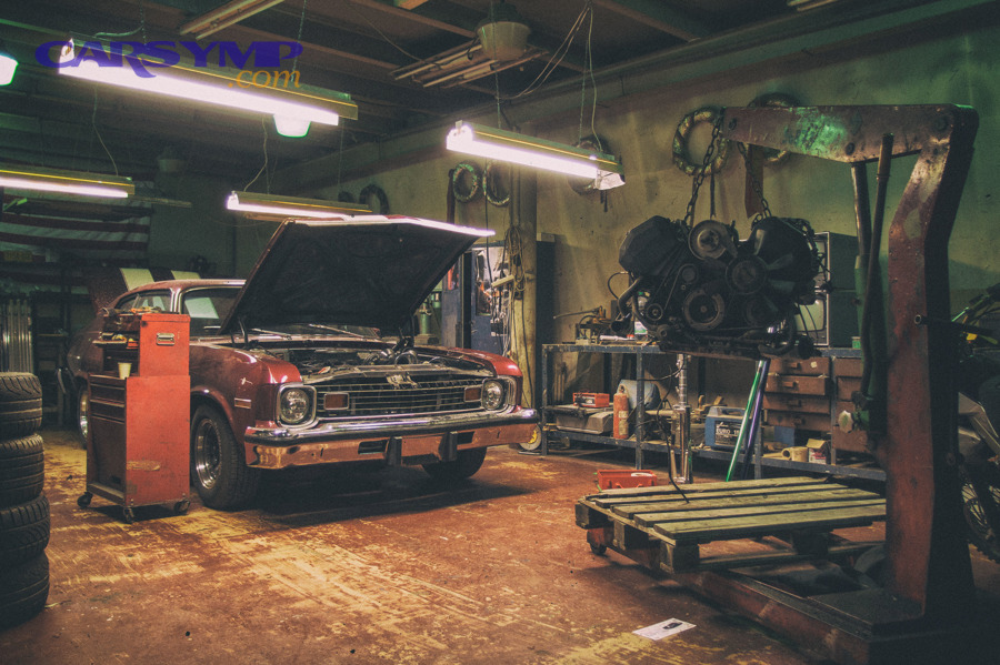 Garage setting representing repair completion and verification