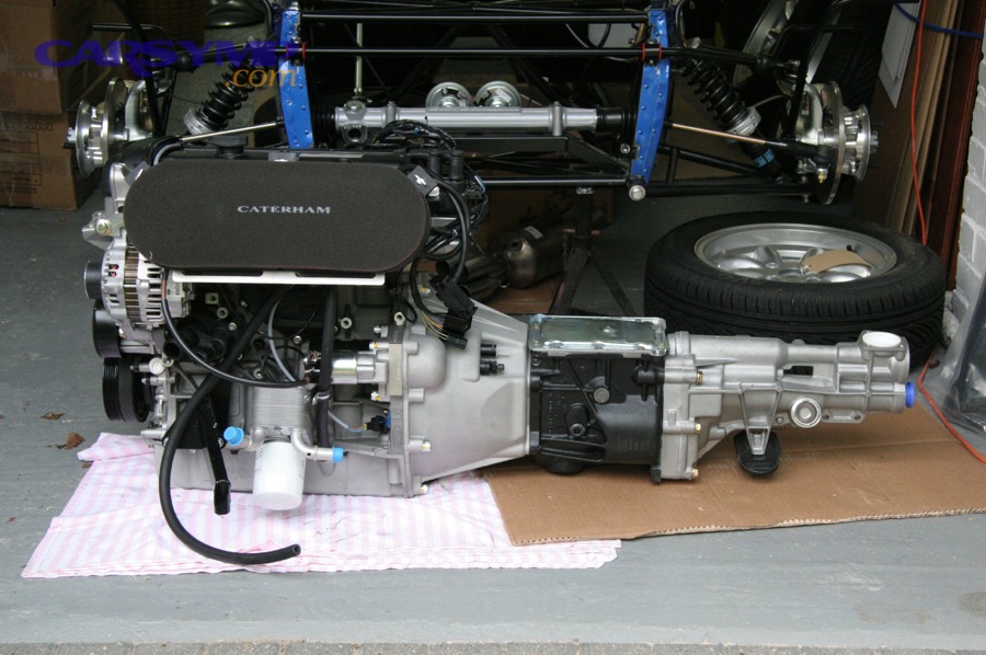 Engine and transmission assembly showing bellhousing area where rear main seal leaks often appear