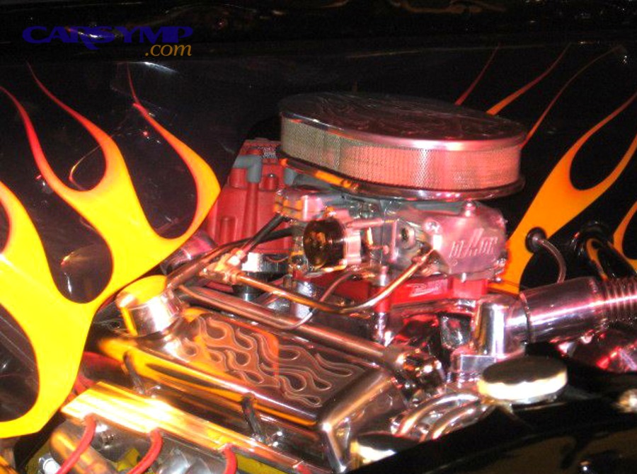 Engine bay photo used to illustrate external leak residue inspection