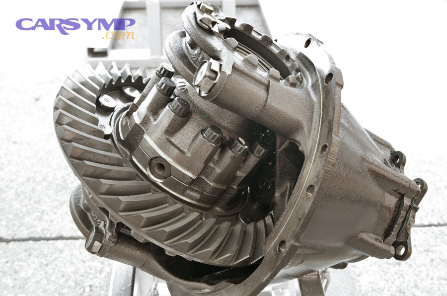 Automotive differential assembly where gear oil condition can indicate wear