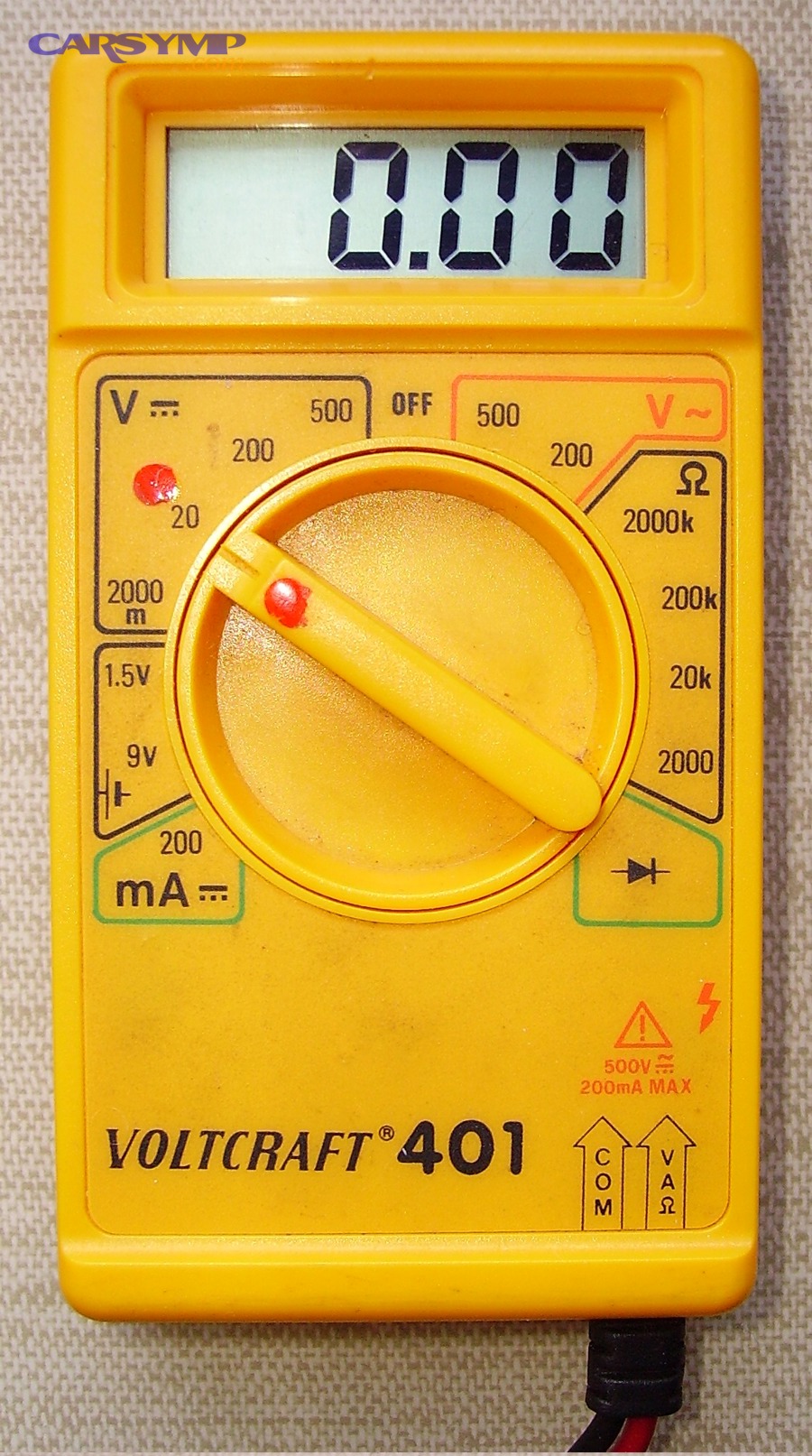 Digital multimeter used for basic electrical checks on a vehicle