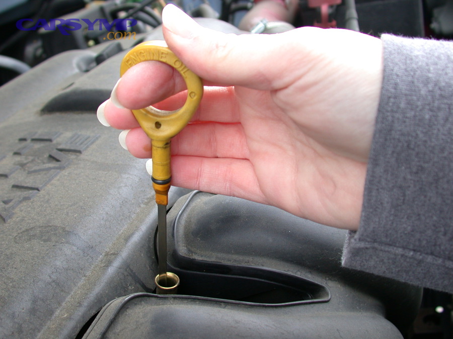 Engine oil dipstick used to measure engine oil level accurately