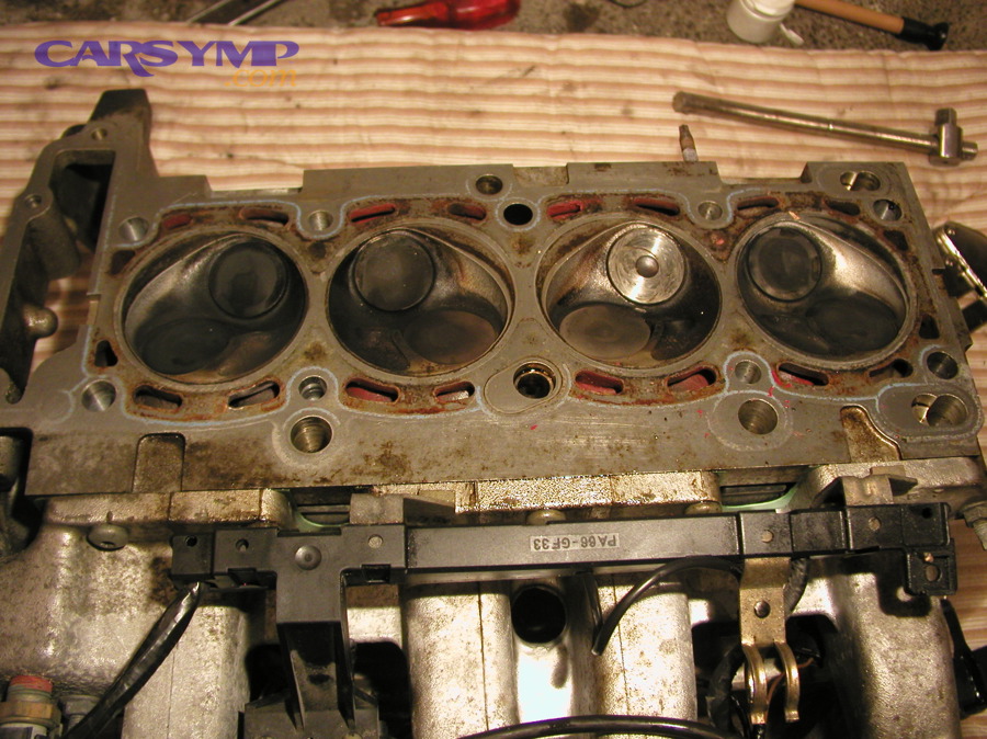 Cylinder head view showing the underside sealing surface and ports